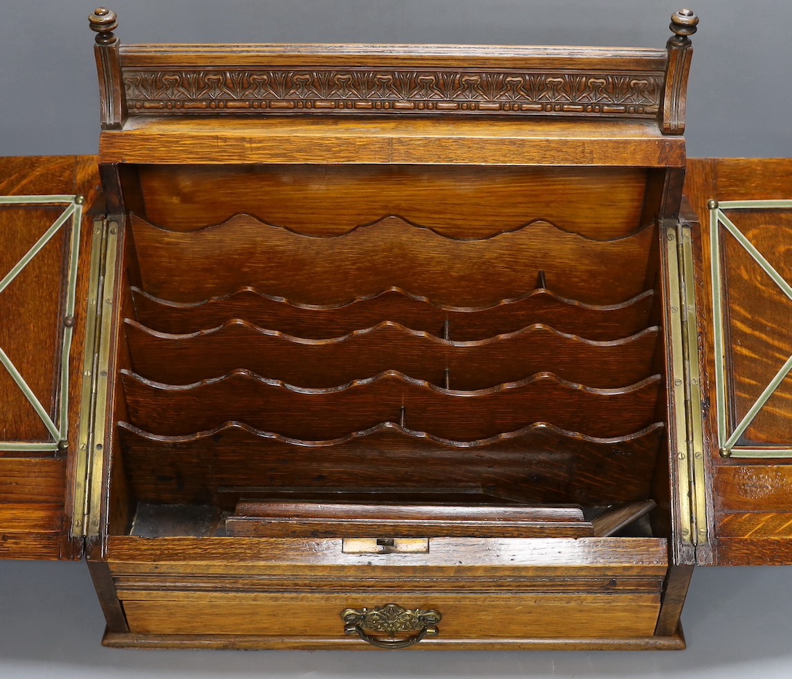 An Edwardian oak stationary box 36cm